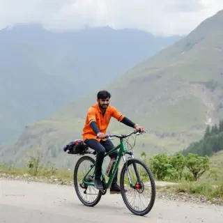 A man is cycling in northern Pakistani